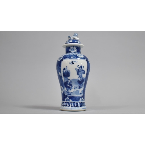 289 - A Small 19th Century Blue and White Baluster Vase and Cover decorated with Figural Cartouches with M... 