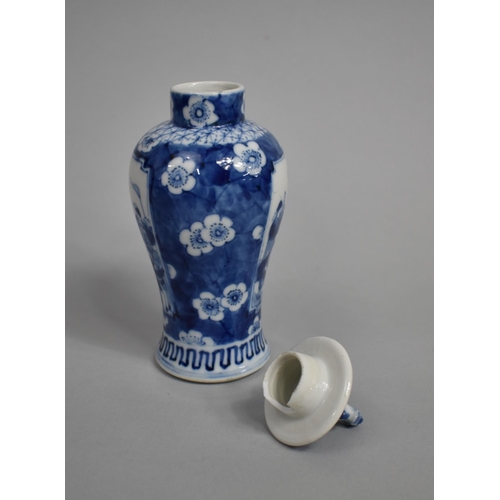 289 - A Small 19th Century Blue and White Baluster Vase and Cover decorated with Figural Cartouches with M... 