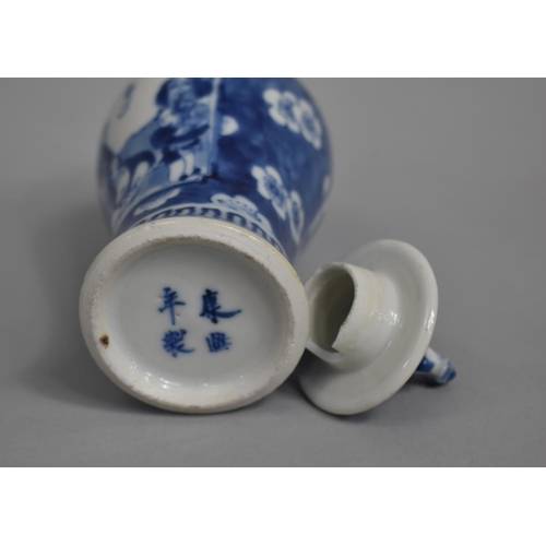 289 - A Small 19th Century Blue and White Baluster Vase and Cover decorated with Figural Cartouches with M... 