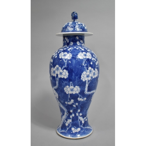 290 - A 19th Century Chinese Blue and White Prunus Pattern Vase and Cover, Baluster Form, The Lid with Tem... 