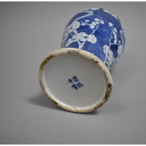 290 - A 19th Century Chinese Blue and White Prunus Pattern Vase and Cover, Baluster Form, The Lid with Tem... 