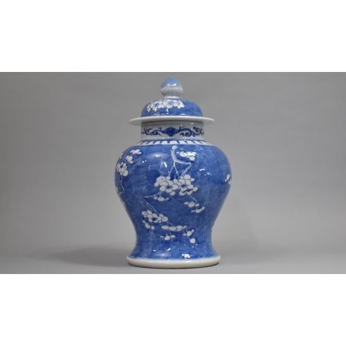 291 - A 19th Century Blue and White Prunus Pattern Vase and Cover, Four Character Mark for Kangxi to Base,... 