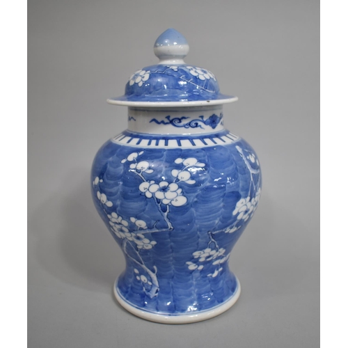 291 - A 19th Century Blue and White Prunus Pattern Vase and Cover, Four Character Mark for Kangxi to Base,... 