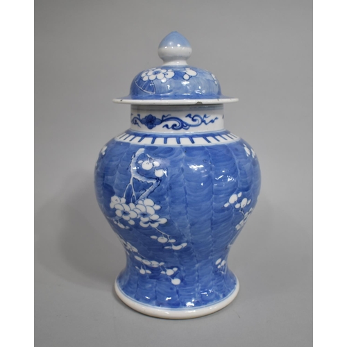 291 - A 19th Century Blue and White Prunus Pattern Vase and Cover, Four Character Mark for Kangxi to Base,... 