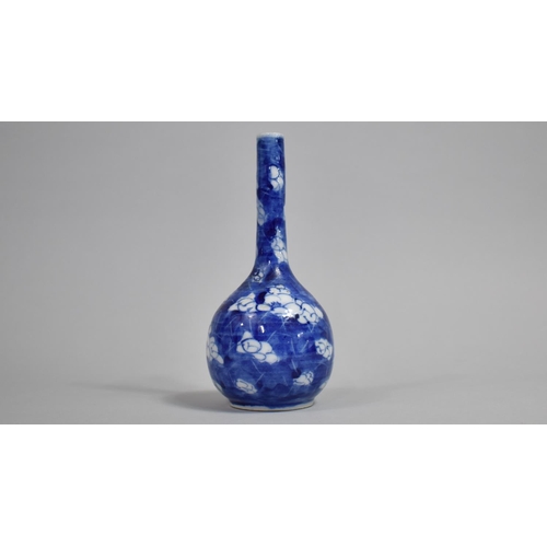 285 - A Japanese Blue and White Prunus Pattern Bottle Vase, 15cm High