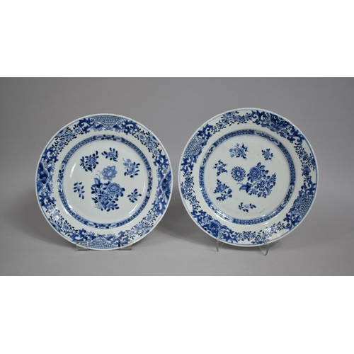 277 - A Pair of 18th/19th Century Chinese Blue and White Plates decorated in Floral Motifs, Condition Issu... 