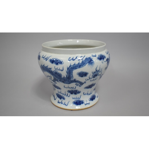 272 - A Chinese Porcelain Blue and White Cachepot of Waisted Top Heavy Form, Decorated with Dragons, 18cm ... 