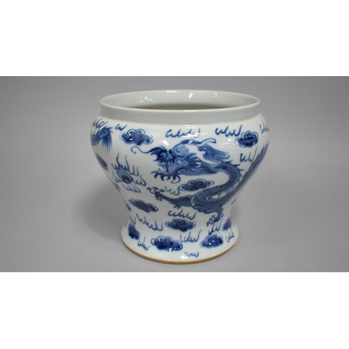 272 - A Chinese Porcelain Blue and White Cachepot of Waisted Top Heavy Form, Decorated with Dragons, 18cm ... 