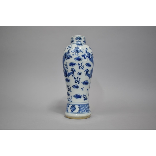 269 - A Chinese Porcelain Blue and White Vase Decorated with Dragon in Clouded and Scrolled Sky, 25cm High