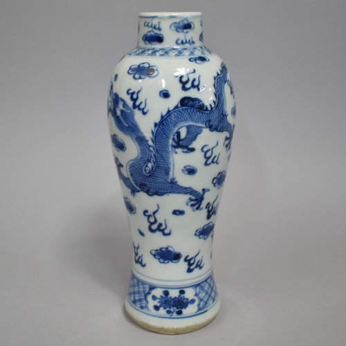 269 - A Chinese Porcelain Blue and White Vase Decorated with Dragon in Clouded and Scrolled Sky, 25cm High