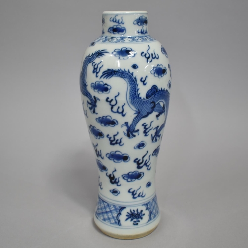 269 - A Chinese Porcelain Blue and White Vase Decorated with Dragon in Clouded and Scrolled Sky, 25cm High