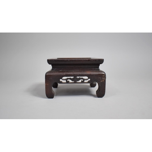 216 - An Early to Mid 20th Century Chinese Square Topped Carved and Pierced Wooden Vase Stand, Raised on S... 