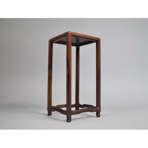 213 - A Tall Chinese Square Topped Wooden Vase Stand, 22cms High and 11cms Square