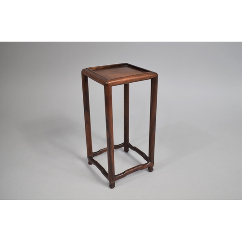 213 - A Tall Chinese Square Topped Wooden Vase Stand, 22cms High and 11cms Square