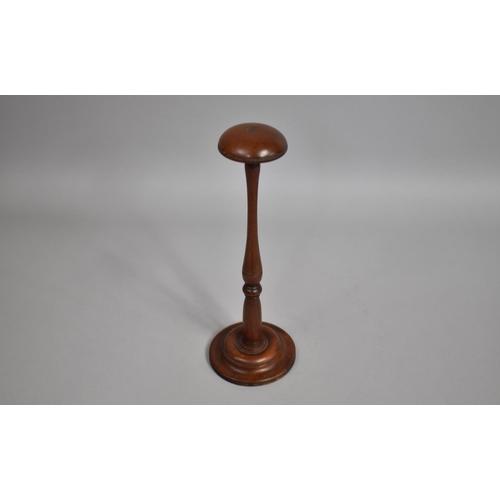 34 - A 19th Century Turned Mahogany Wig Stand, 29cm high