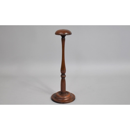 34 - A 19th Century Turned Mahogany Wig Stand, 29cm high