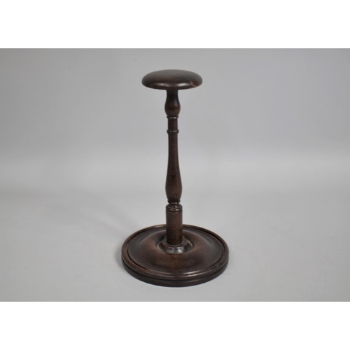 33 - A 19th Century Turned Mahogany Wig Stand, 26cm high