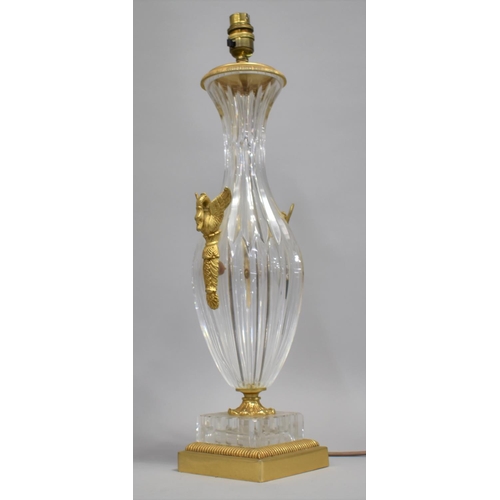 442 - A Cut Glass and Gilt Metal Mounted Table Lamp with twin swan handles, stepped base, 45cm high