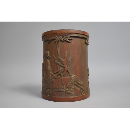 227 - A Chinese Bamboo Brush Pot decorated in Carved Relief with Figure Seated at Water Side with Lilies E... 