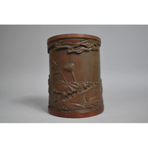 227 - A Chinese Bamboo Brush Pot decorated in Carved Relief with Figure Seated at Water Side with Lilies E... 