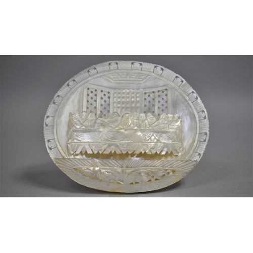 51 - A Carved and Pierced Mother of Pearl Shell, The Last Supper, with Easel Back, 16cms Wide
