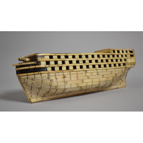 55 - An 18th Century Prisoner of War Bone Model of a Ship, the hull with bone and wood planks pinned with... 