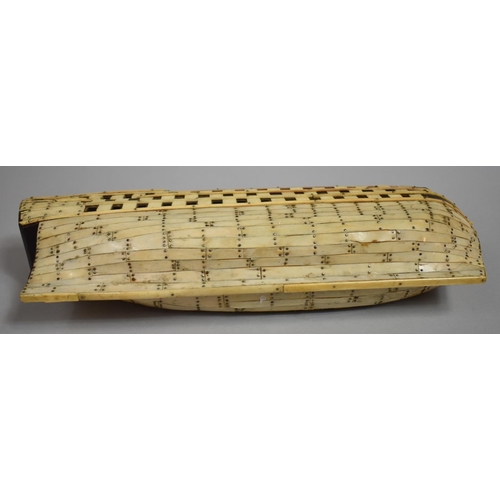 55 - An 18th Century Prisoner of War Bone Model of a Ship, the hull with bone and wood planks pinned with... 