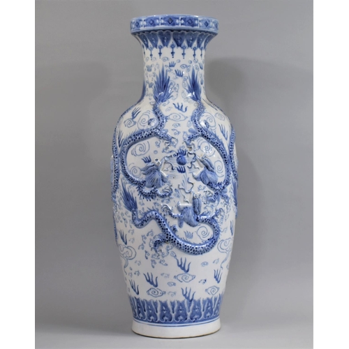 265 - A Large Decorative 20th Century Chinese Blue and White Decorative Floor Vase, in Shallow Relief with... 