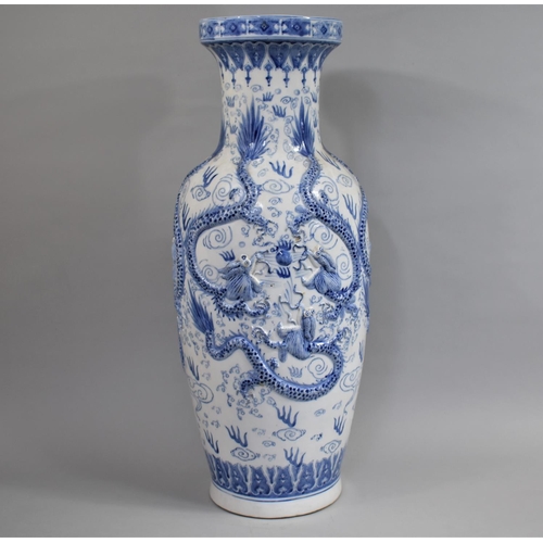 265 - A Large Decorative 20th Century Chinese Blue and White Decorative Floor Vase, in Shallow Relief with... 