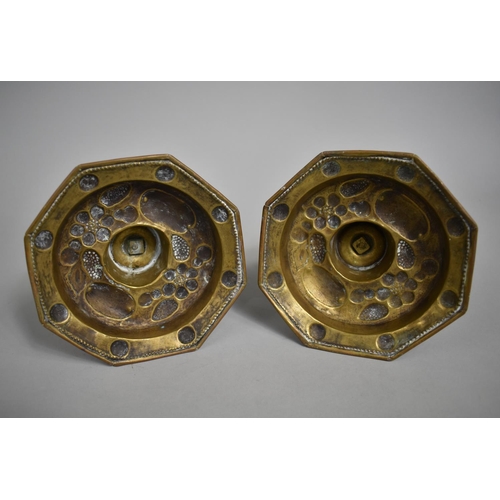 112 - A Pair of 18th/19th Century Dutch Brass Embossed Candlesticks with Fruit and Foliate Design having S... 