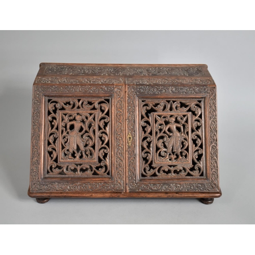 4 - A 19th Century Anglo Indian Colonial Stationery Cabinet with Intricately Carved Decoration and Doors... 