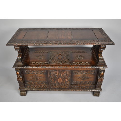 99 - A Carved Oak Monks Bench with Hinged Seat and Having Heavily Carved Panels and Back Rest, with Carve... 