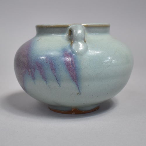 264 - A Chinese Jun Ware Splash Jar, Squat Bellied Form, with Twin Handles, Purple and Blue Glaze. 9.5cms ... 