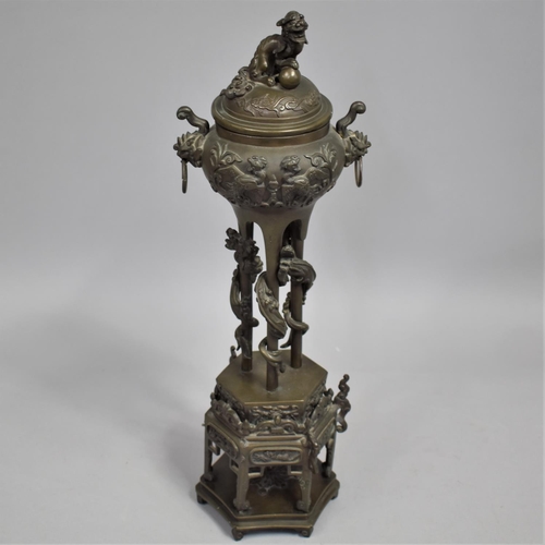 238 - A Japanese Bronze Koro with Domed Cover, Surmounted by Temple Lion, The Body Decorated in Shallow Re... 