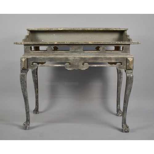 26 - A 19th century Painted Pine Console Table with a Stepped Frieze Over a Plank Top and Pierced Rails, ... 