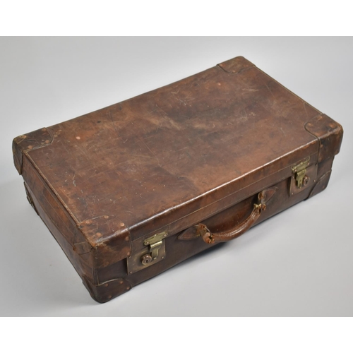 448 - A Large Early 20th Century Leather Suitcase, 45x22x76cms Long