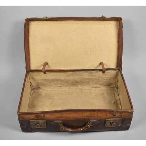 448 - A Large Early 20th Century Leather Suitcase, 45x22x76cms Long