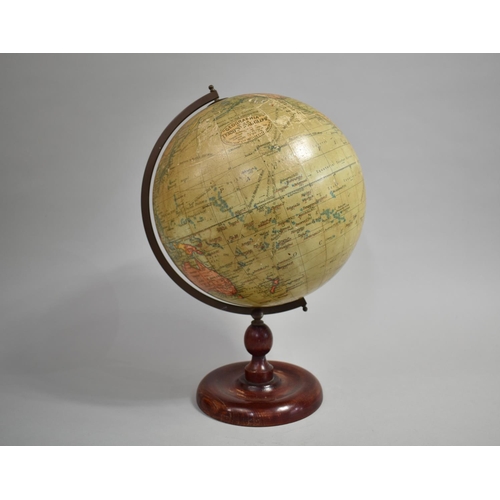 58 - An Early 20th Century Geographia 10 Inch Terrestrial Globe on a Turned Wooden Stand, 40cms HIgh
