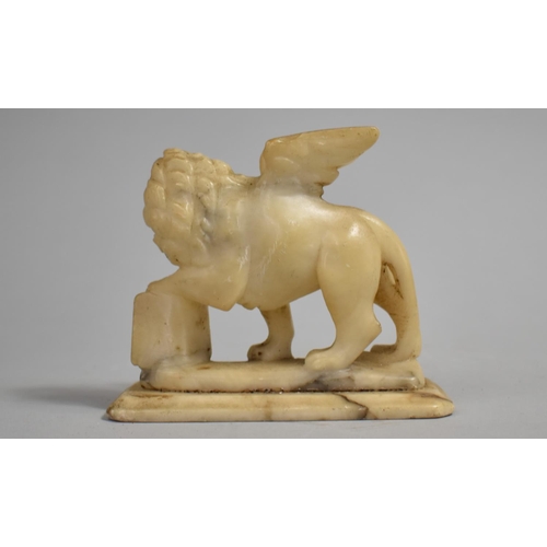 40 - A 19th Century Carved Alabaster Grand Tour Souvenir of the Lion of Saint Mark, 11cms Wide by 10cms H... 