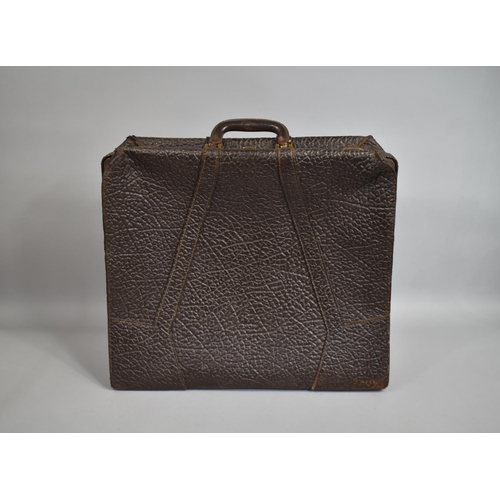 64 - A 1930's Elephant Hide Suitcase with Brass Fittings, 48x56cms Wide