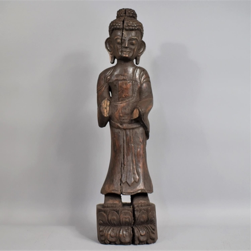 74 - A 19th Century Burmese Carved Teak Standing Buddha Supported on a Carved Lotus Flower Plinth, Some T... 