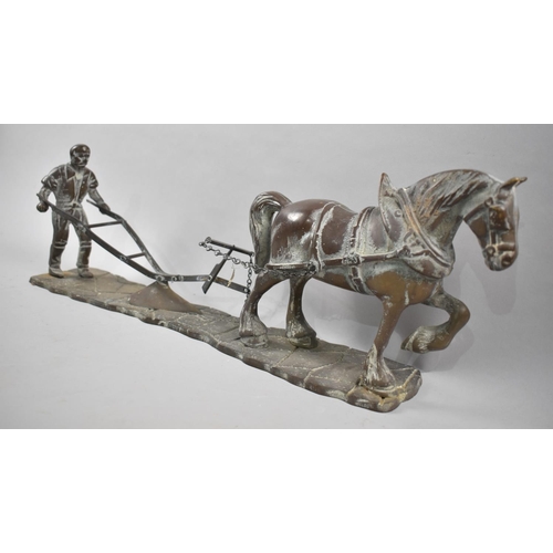 101 - A Large Heavy Brass Study of Horse Ploughing, 52cms Long