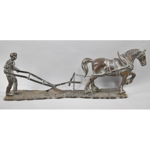 101 - A Large Heavy Brass Study of Horse Ploughing, 52cms Long