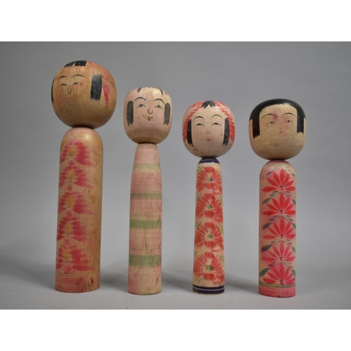 110 - A Set of Four Chinese Kokeshi Dolls, Tallest 30cms High