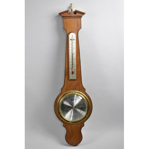 114 - A Modern Wheel Barometer and Thermometer by Comitti, 60cms High