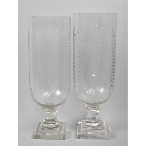 136 - A Near Pair of Tall Cut Crystal Hurricane Glass Vases, 34.5cms High