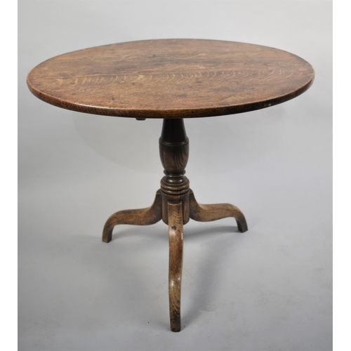 426 - A 19th Century Oak Former Snap Top Circular Table on Tripod Base, 84cms Diameter