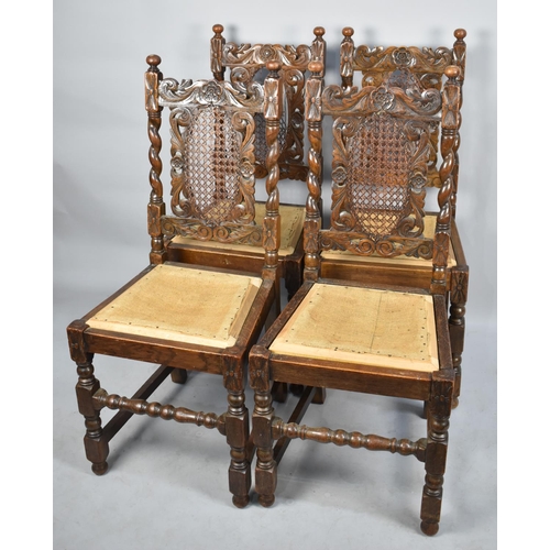 429 - A Set of Four Mid 20th Century Carved Oak Gothic Style Side Chairs with Caned Backs, all Require reu... 