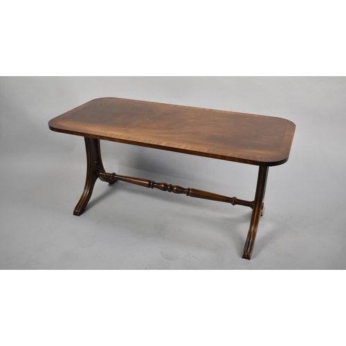 441 - A Modern Cross Banded Mahogany Coffee Table, 90cms by 45cms