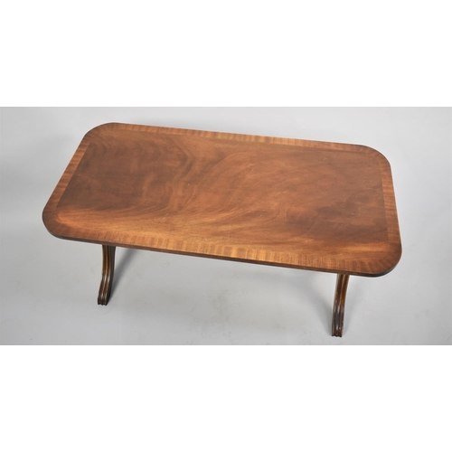 441 - A Modern Cross Banded Mahogany Coffee Table, 90cms by 45cms